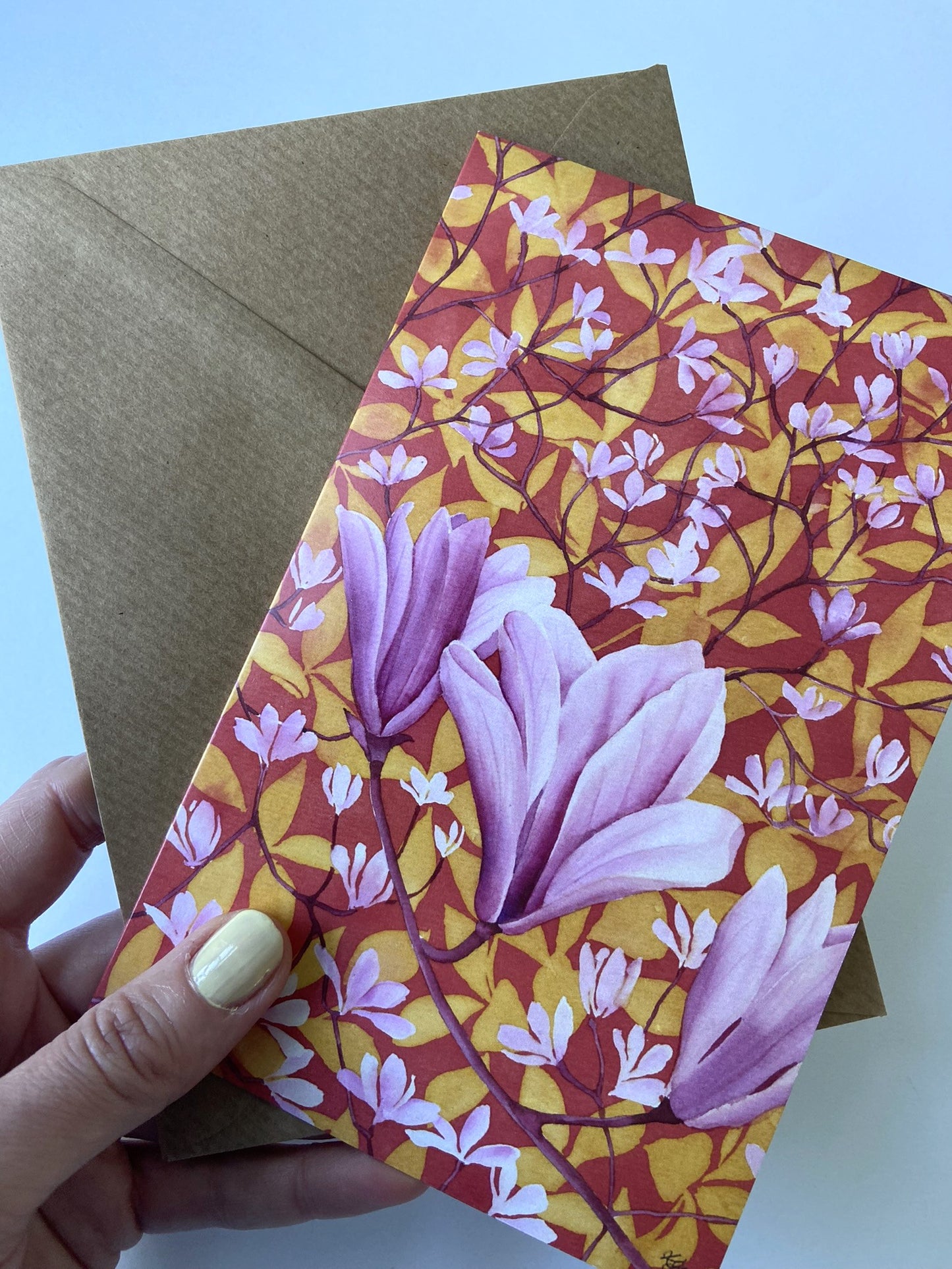 Card Magnolia on orange