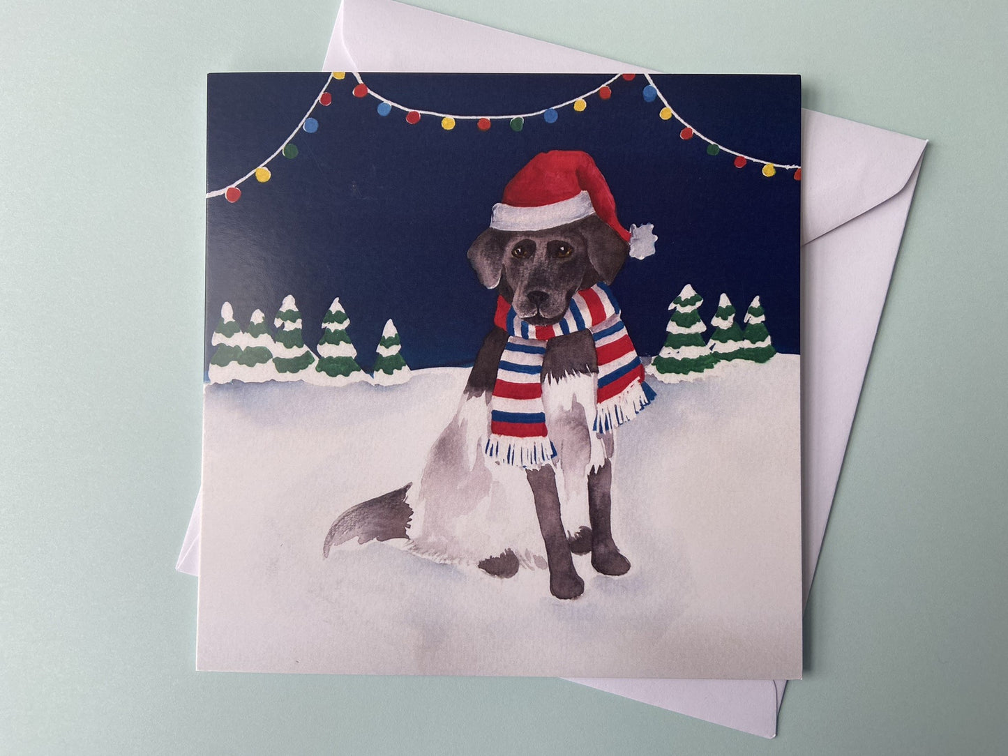 Kerstkaart Hond in de sneeuw